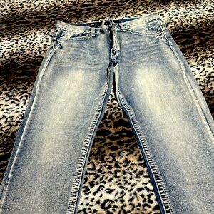 A pair of brand new Jeans never worn before They are True Luck size 34/30 men’s